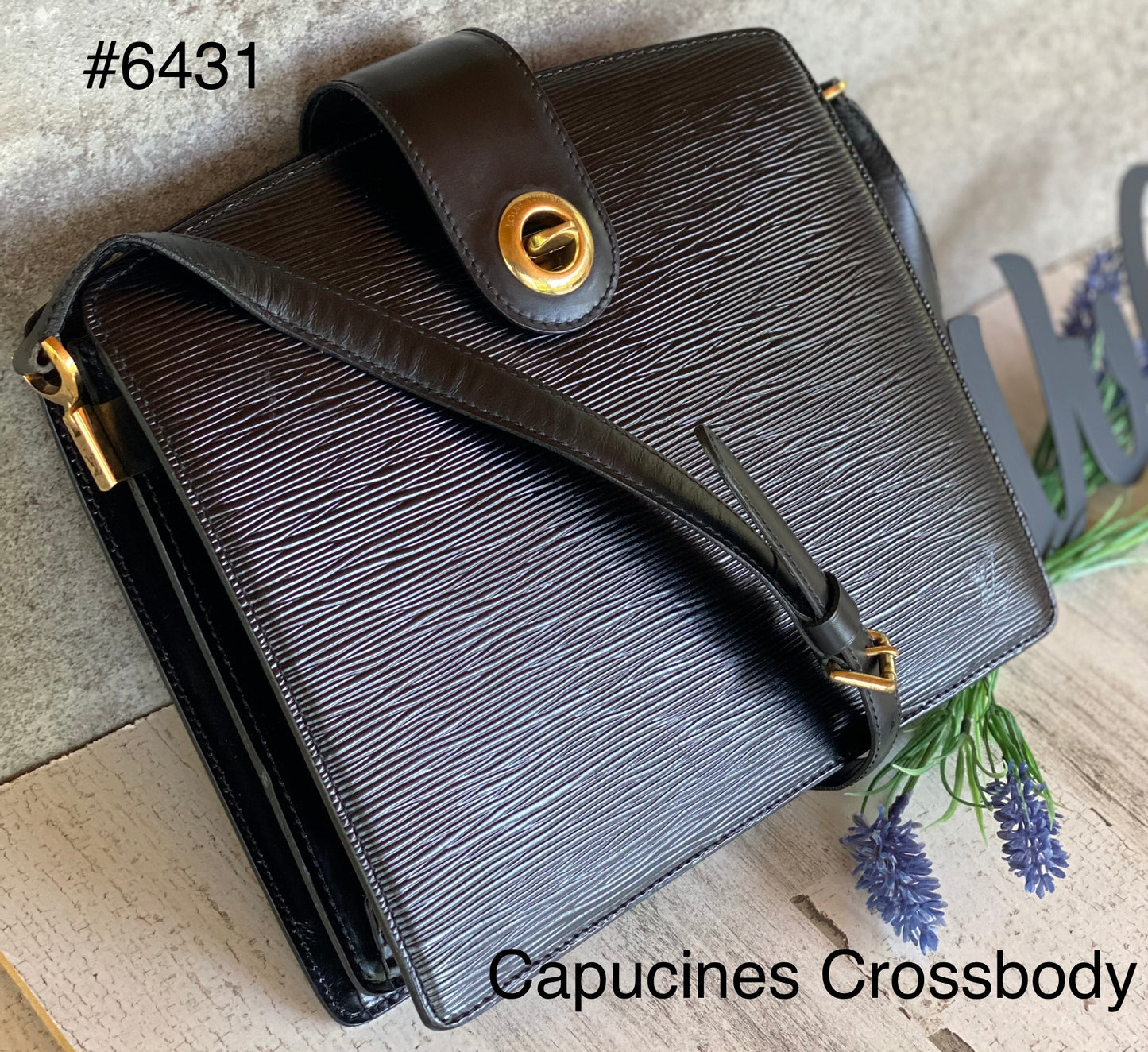 Authentic preloved Black Epi Capucines Crossbody